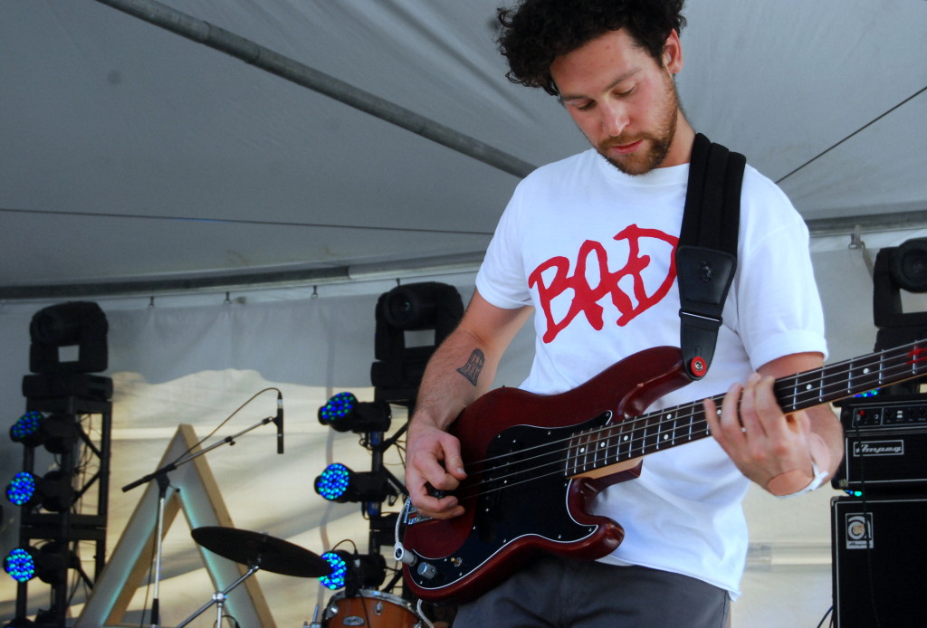 Zavh Bines, bass player for Weaves, getting his groove on at Arboretum 2014. Photo: Jeff Watkins