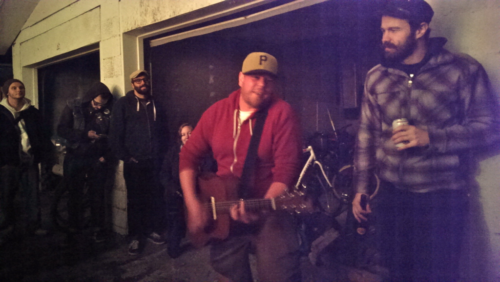 Jon Creeden surrounded by his friends at Minou's House in Ottawa.