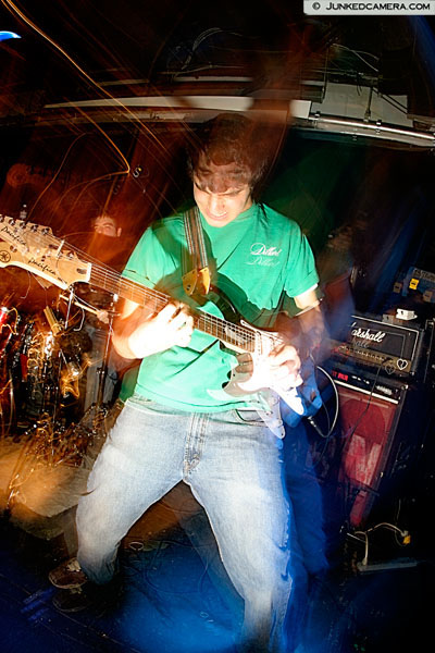 Matt Gilmore slaying it as the guitarist of We The Accused at Club Saw in Ottawa - December 17th, 2004. Photo: Junked Camera